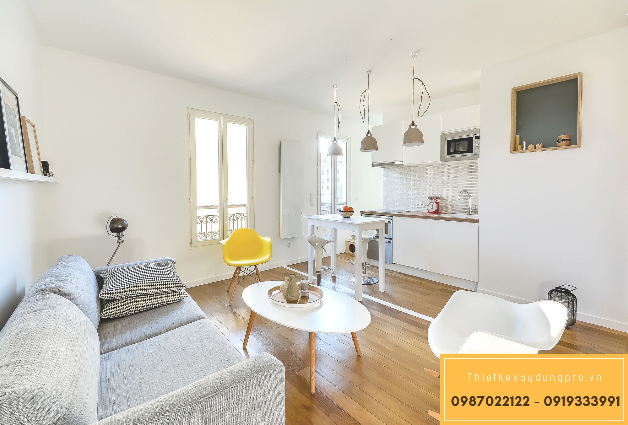 thiet-ke-phong-khach-30m2_18 Tông màu trắng trang nhã