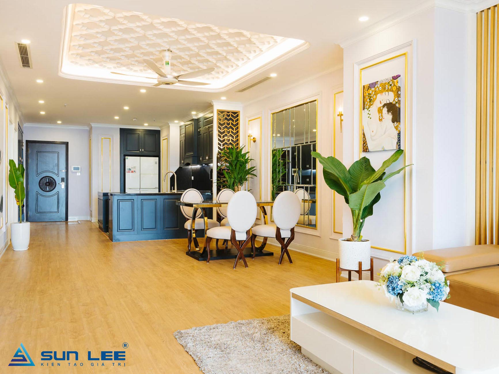Việc sở hữu một căn hộ chung cư hiện đại và đẹp không chỉ đem lại sự thoải mái mà còn thể hiện phong cách sống và cá tính của gia chủ. Tuy nhiên, để biến ước mơ về căn hộ chung cư đẹp thành hiện thực, việc thi công nội thất chung cư đòi hỏi sự tư vấn, lựa chọn, và thiết kế tỉ mỉ. Trong bài viết này, chúng ta sẽ tìm hiểu về các yếu tố cần thiết để tạo nên một căn hộ chung cư đẹp và ấn tượng, từ việc lựa chọn vật liệu, thiết kế đến thi công hoàn thiện. Lựa chọn vật liệu và màu sắc trong thi công nội thất chung cư đẹp 1. Chọn vật liệu phù hợp Việc chọn vật liệu trang trí nội thất phù hợp là một trong những yếu tố quan trọng nhất để tạo nên một căn hộ chung cư đẹp. Dưới đây là một số loại vật liệu bạn có thể xem xét: -Gỗ tự nhiên: Gỗ tự nhiên là một lựa chọn phổ biến cho việc trang trí nội thất chung cư. Gỗ mang lại vẻ ấm áp, sang trọng và có tính bền bỉ cao. Bạn có thể sử dụng gỗ cho sàn, tủ kệ, bàn ghế và các chi tiết trang trí khác. -Gỗ MDF: Gỗ MDF (Medium Density Fiberboard) là một vật liệu phụ chế tạo từ gỗ ép và keo. Nó thường được sử dụng để làm tủ bếp, tủ quần áo và các chi tiết trang trí khác. Gỗ MDF có độ bền cao và có thể được hoàn thiện với nhiều màu sắc và hoa văn. -Kim loại: Kim loại như thép không gỉ, nhôm và đồng có thể được sử dụng để làm các bộ ghế, bàn và các chi tiết trang trí khác. Kim loại mang lại vẻ hiện đại và công nghiệp cho không gian. -Da và vải: Da và vải là lựa chọn tốt cho việc trang trí ghế sofa, giường ngủ và ghế ăn. Chúng đem lại sự thoải mái và mềm mại cho không gian. 2. Màu sắc sáng tạo Lựa chọn màu sắc là một phần quan trọng trong việc thi công nội thất chung cư đẹp. Màu sắc có thể tạo ra sự hài hòa, tạo điểm nhấn và tạo cảm giác thoải mái. Dưới đây là một số ý tưởng về màu sắc: -Trắng và đen: Kết hợp giữa trắng và đen làm cho căn hộ trở nên sang trọng và hiện đại. Trắng mang lại sự tinh tế và độ sáng, trong khi đen tạo điểm nhấn và sâu sắc. -Màu xanh dương: Màu xanh dương mang lại cảm giác yên bình và mát mẻ. Nó thích hợp cho các căn hộ gần biển hoặc có thiên nhiên xung quanh. -Màu ghi bạc: Màu ghi bạc làm cho không gian trở nên sang trọng và thanh lịch. Nó thường được sử dụng trong việc trang trí nội thất phòng khách và phòng ngủ. Thi công nội thất chung cư đẹp trọn gói gồm những hạng mục gì? Khi bạn quyết định thi công nội thất chung cư đẹp trọn gói, bạn đang tìm kiếm một giải pháp toàn diện để biến căn hộ của mình thành một không gian sống hoàn hảo và đáng mơ ước. Quá trình này bao gồm nhiều hạng mục công việc khác nhau, từ thiết kế, lựa chọn vật liệu đến thi công và hoàn thiện trang trí. Dưới đây là những hạng mục quan trọng thường được bao gồm trong dự án thi công nội thất chung cư đẹp trọn gói: -Thi công cải tạo phần thô: Đối với nhiều căn hộ chung cư cũ hoặc đã sử dụng một thời gian dài, việc cải tạo phần thô là bước đầu tiên. Điều này bao gồm việc loại bỏ các thành phần cũ không còn cần thiết, thay đổi cấu trúc không gian, và làm sáng bừa không gian ban đầu để chuẩn bị cho việc thi công nội thất mới. -Thi công điện nước: Việc thi công điện nước là một phần quan trọng để đảm bảo rằng hệ thống điện và nước trong căn hộ hoạt động một cách an toàn và hiệu quả. Điều này bao gồm việc lắp đặt điện, điều hòa không khí, thiết bị nước, bảng điều khiển và các thành phần liên quan khác. -Thi công trần – sàn: Việc thi công trần và sàn đóng vai trò quan trọng trong việc tạo ra không gian sống đẹp và thoải mái. Trần thạch cao là một lựa chọn phổ biến để tạo ra các hình thức trần đẹp và hiện đại, trong khi sàn gỗ, gạch ceramic, hoặc đá tự nhiên có thể được sử dụng để làm sàn, tạo nên sự ấm cúng và tiện nghi. -Thi công thạch cao – sơn bả: Việc thi công thạch cao và sơn bả giúp tạo nên không gian sáng và thoải mái. Thạch cao có thể được sử dụng để tạo ra các bức trần, tạo hình và vật trang trí khác nhau. Sơn bả sẽ tạo nên màu sắc và vẻ đẹp cho các bức tường, tạo nền cho việc trang trí nội thất sau này. -Thi công trang trí nội thất: Cuối cùng, việc thi công trang trí nội thất là bước cuối cùng để tạo nên một không gian sống đẹp và thoải mái. Bạn có thể thêm các chi tiết trang trí như tranh, thảm, đèn trang trí, cây cảnh, và nhiều vật trang sức khác để tạo nên không gian độc đáo và phong cách. Tại sao nên lựa chọn đúng đơn vị thi công nội thất ? -Chất lượng công việc: Một đơn vị thi công uy tín thường có đội ngũ thợ lành nghề, có kiến thức và kỹ thuật cần thiết để thực hiện các công việc một cách chuyên nghiệp. Điều này đảm bảo rằng bạn sẽ nhận được sản phẩm cuối cùng chất lượng, đẹp mắt và bền bỉ. -Tuân thủ tiến độ: Đơn vị uy tín thường cam kết và tuân thủ tiến độ thi công. Điều này giúp bạn có kế hoạch và sắp xếp cuộc sống của mình một cách thuận lợi, không phải lo lắng về sự trễ hẹn không cần thiết. -Bảo hành và dịch vụ sau bán hàng: Đơn vị uy tín thường có chính sách bảo hành rõ ràng và cam kết dịch vụ sau bán hàng tốt. Nếu có vấn đề xảy ra sau khi hoàn thiện dự án, bạn có thể yên tâm rằng họ sẽ hỗ trợ bạn giải quyết. -Khả năng tư vấn thiết kế: Nhiều đơn vị uy tín không chỉ thực hiện thi công mà còn có khả năng tư vấn thiết kế. Điều này giúp bạn có một góc nhìn chuyên nghiệp và sáng tạo cho căn hộ của bạn. Yếu tố cần xem xét khi lựa chọn đơn vị thi công nội thất uy tín: Kiểm tra kinh nghiệm của đơn vị thi công bằng cách xem xét các dự án đã hoàn thành trước đó. Hỏi về số năm hoạt động và các chứng chỉ liên quan. -Uy tín và đánh giá: Tra cứu về uy tín của đơn vị qua đánh giá từ khách hàng trước đó. Bạn có thể tìm kiếm trên mạng, tham khảo ý kiến từ người quen, hoặc yêu cầu đơn vị cung cấp danh sách các dự án đã thực hiện để bạn kiểm tra. -Giấy phép và bảo hiểm: Đảm bảo rằng đơn vị thi công có đủ giấy phép hoạt động và bảo hiểm hợp pháp. Điều này làm đảm bảo tính hợp pháp và an toàn cho dự án của bạn. -Khả năng tư vấn thiết kế: Kiểm tra xem đơn vị có khả năng tư vấn và tham gia vào quá trình thiết kế không. Khả năng này giúp bạn tối ưu hóa không gian và có sự thống nhất trong thiết kế. -Ngân sách: So sánh giá cả và khả năng của đơn vị với ngân sách của bạn. Hãy nhớ rằng giá thấp không phải lúc nào cũng đảm bảo chất lượng. -Hợp đồng rõ ràng: Trước khi bắt đầu, đảm bảo rằng bạn và đơn vị thi công đã ký hợp đồng có chứa đầy đủ thông tin về dự án, tiến độ, và điều kiện thanh toán. -Khả năng trò chuyện và hiểu nhau: Cuối cùng, hãy thử trò chuyện và làm việc với đơn vị thi công để đảm bảo bạn có thể hiểu và giao tiếp với nhau một cách hiệu quả. Mối quan hệ tốt giữa bạn và đội thi công là quan trọng để dự án diễn ra suôn sẻ. Quy trình thiết kế thi công nội thất chung cư tại SUNLEE SUNLEE tự hào là một đơn vị chuyên nghiệp trong lĩnh vực thiết kế và thi công nội thất chung cư. Chúng tôi cam kết đem đến cho khách hàng những không gian sống đẹp và tiện nghi thông qua quy trình thiết kế và thi công tỉ mỉ. Dưới đây là quy trình chi tiết mà chúng tôi thực hiện để đảm bảo rằng dự án của bạn được hoàn thành một cách chất lượng và đáp ứng mọi yêu cầu của bạn. -Khảo sát thực tế – ký hợp đồng thi công: Bước đầu tiên của quy trình là cuộc khảo sát thực tế. Tại đây, SUNLEE luôn lắng nghe và hiểu rõ ý định của bạn về căn hộ chung cư. Sau đó, chúng tôi sẽ tiến hành khảo sát căn hộ của bạn để đánh giá tình trạng hiện tại và các yếu tố ảnh hưởng đến việc thiết kế và thi công. Khi đã thống nhất mọi thứ sẽ tiến hành ký hợp đồng thi công. -Đo đạc, khảo hiện trạng trước thi công: Sau khi đã có hợp đồng, đội ngũ của chúng tôi sẽ tiến hành đo đạc và khảo sát hiện trạng của căn hộ. Điều này bao gồm việc đo kích thước, xác định vị trí cửa, cửa sổ, ống nước, ống điện, và các yếu tố cấu trúc nào khác có thể ảnh hưởng đến việc thiết kế và thi công. -Thi công, cải tạo phần thô: Bước tiếp theo trong quy trình là thi công và cải tạo phần thô. Chúng tôi sẽ tiến hành các công việc cơ bản như loại bỏ các thành phần cũ không còn cần thiết, thay đổi cấu trúc không gian, và làm sạch không gian ban đầu để chuẩn bị cho việc thi công nội thất mới. -Sản xuất các sản phẩm nội thất theo thiết kế tại xưởng: Chúng tôi có xưởng sản xuất nội thất riêng, nơi chúng tôi tạo ra các sản phẩm nội thất theo thiết kế đã được chốt. Tại đây, các sản phẩm như tủ kệ, bàn, ghế, và các thành phần nội thất khác được sản xuất với sự tỉ mỉ và chất lượng cao. Việc sản xuất tại xưởng giúp đảm bảo sự chính xác và kiểm soát được tiến độ sản xuất. -Thi công trang trí nội thất: Sau khi đã hoàn thành các công việc cơ bản, chúng tôi tiến hành thi công trang trí nội thất. Tại đây, các sản phẩm nội thất đã được sản xuất tại xưởng sẽ được lắp đặt vào vị trí đã được xác định trong thiết kế. Các công việc trang trí như lắp đặt đèn, thảm, tranh và các chi tiết khác sẽ được thực hiện để tạo nên không gian sống đẹp và thoải mái. -Vệ sinh, nghiệm thu bàn giao: Cuối cùng, sau khi tất cả các công việc đã hoàn thành, chúng tôi tiến hành vệ sinh kỹ thuật để đảm bảo sự sạch sẽ và sẵn sàng cho việc sử dụng. Sau đó, quá trình nghiệm thu bàn giao sẽ diễn ra, trong đó bạn và đội thi công sẽ kiểm tra tất cả các công việc đã hoàn thành và đảm bảo rằng chúng đáp ứng các tiêu chuẩn và yêu cầu ban đầu. Thi công nội thất chung cư đẹp đòi hỏi sự tư vấn, lựa chọn, thiết kế, và thi công tỉ mỉ. Tuy nhiên, với sự tỉ mỉ và tâm huyết, bạn có thể biến ước mơ về một căn hộ chung cư đẹp thành hiện thực. Sử dụng những yếu tố về vật liệu, màu sắc, thiết kế và ánh sáng để tạo nên không gian sống hoàn hảo theo phong cách riêng của bạn. Thi công nội căn hộ chung cư đẹp đòi hỏi sự tư vấn, lựa chọn, thiết kế, và thi công tỉ mỉ.