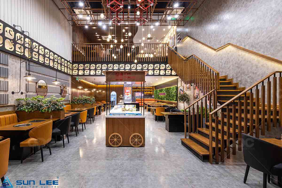 Thiết kế quán lẩu nướng đẹp là sự kết hợp hoàn hảo giữa thẩm mỹ và công năng, nhằm tạo ra không gian thu hút
